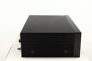 Left side view of a used Nakamichi Dragon Cassette Deck in a black finish