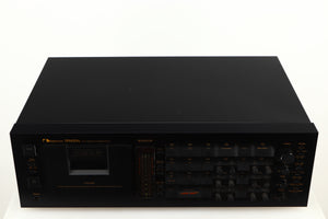 Top of a used Nakamichi Dragon Cassette Deck in a black finish