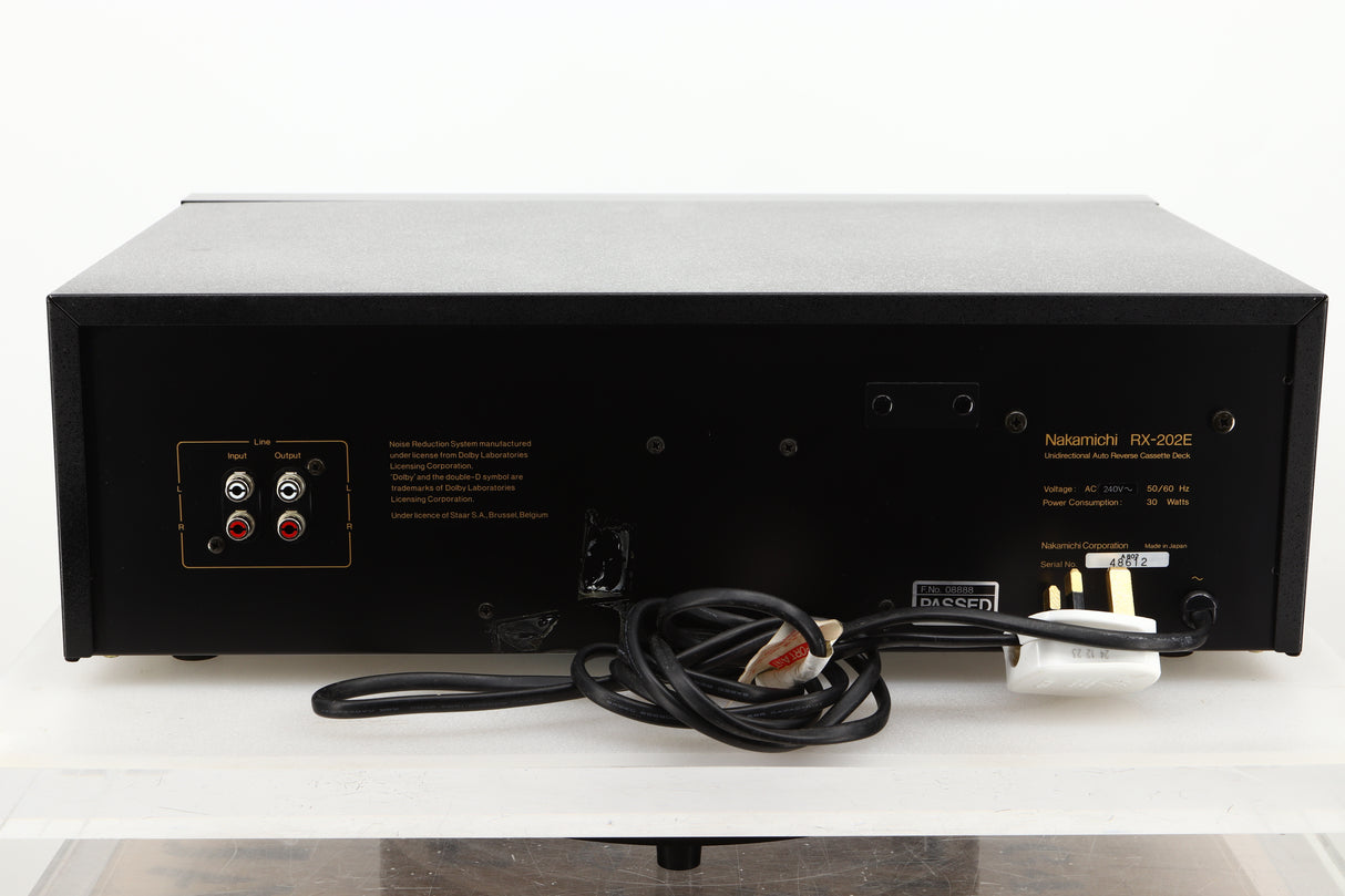 Rear view of a used Nakamichi RX-202E Cassette Deck showing RCA input and output