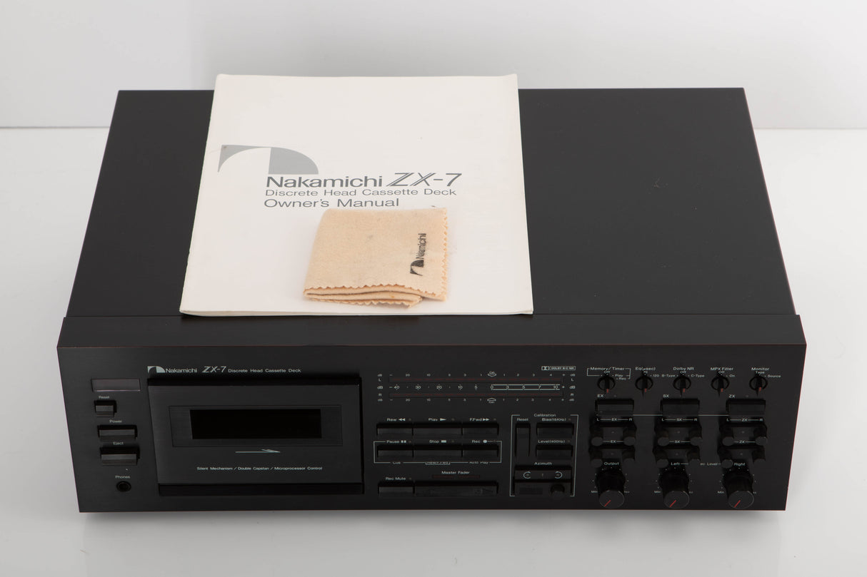 Top of a used Nakamichi ZX-7 Cassette Deck in a black finish showing Manual and Cleaning Cloth
