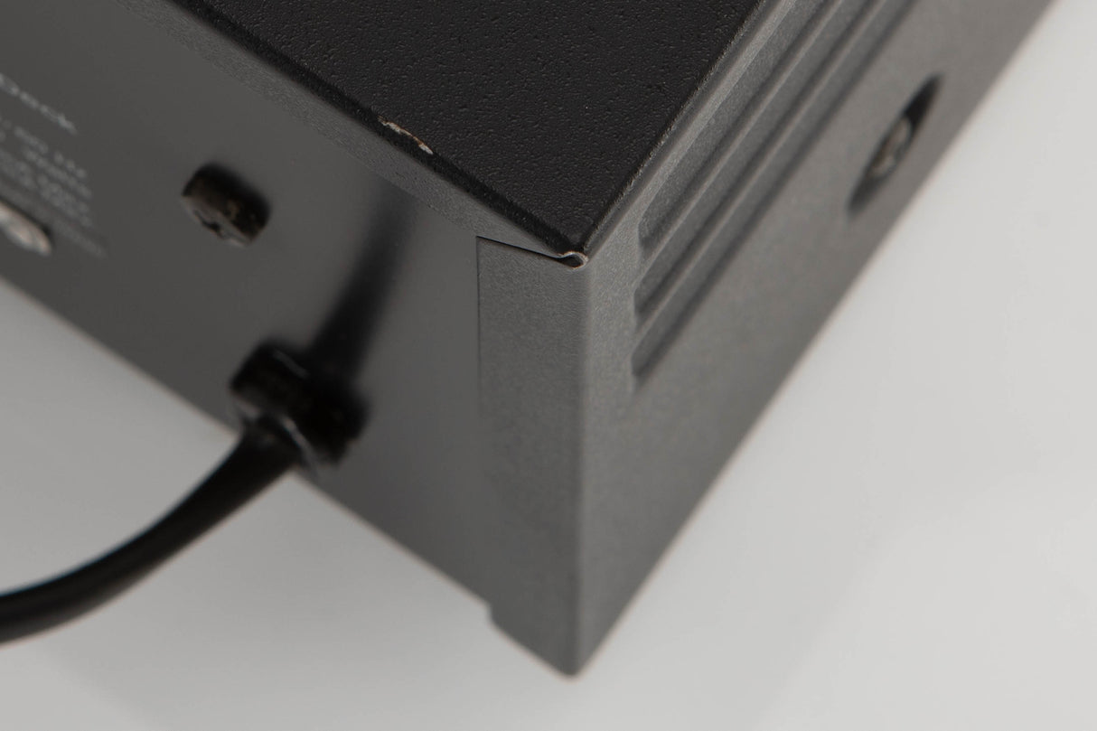 Close up of a used Nakamichi ZX-7 Cassette Deck in a black finish showing scratch on rear edge