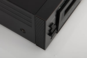 Front left corner of a used Nakamichi ZX-7 Cassette Deck in a black finish