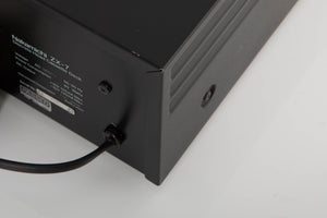 Rear left corner of a used Nakamichi ZX-7 Cassette Deck in a black finish