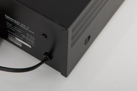 Rear left corner of a used Nakamichi ZX-7 Cassette Deck in a black finish