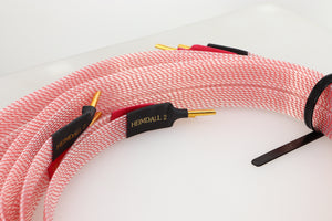 Close up of a used Nordost Heimdall 2 Speaker Cables 2.0m Pair in a pink finish showing connectors