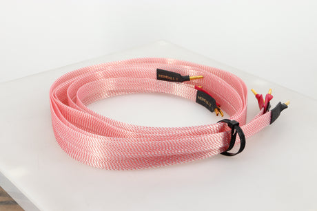 Rear left angle of a used Nordost Heimdall 2 Speaker Cables 2.0m Pair in a pink finish