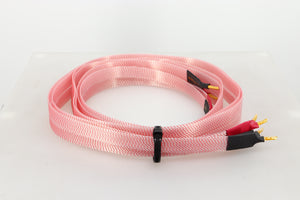Left side view of a used Nordost Heimdall 2 Speaker Cables 2.0m Pair in a pink finish