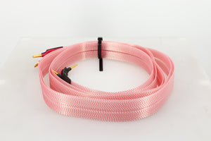 Right side view of a used Nordost Heimdall 2 Speaker Cables 2.0m Pair in a pink finish