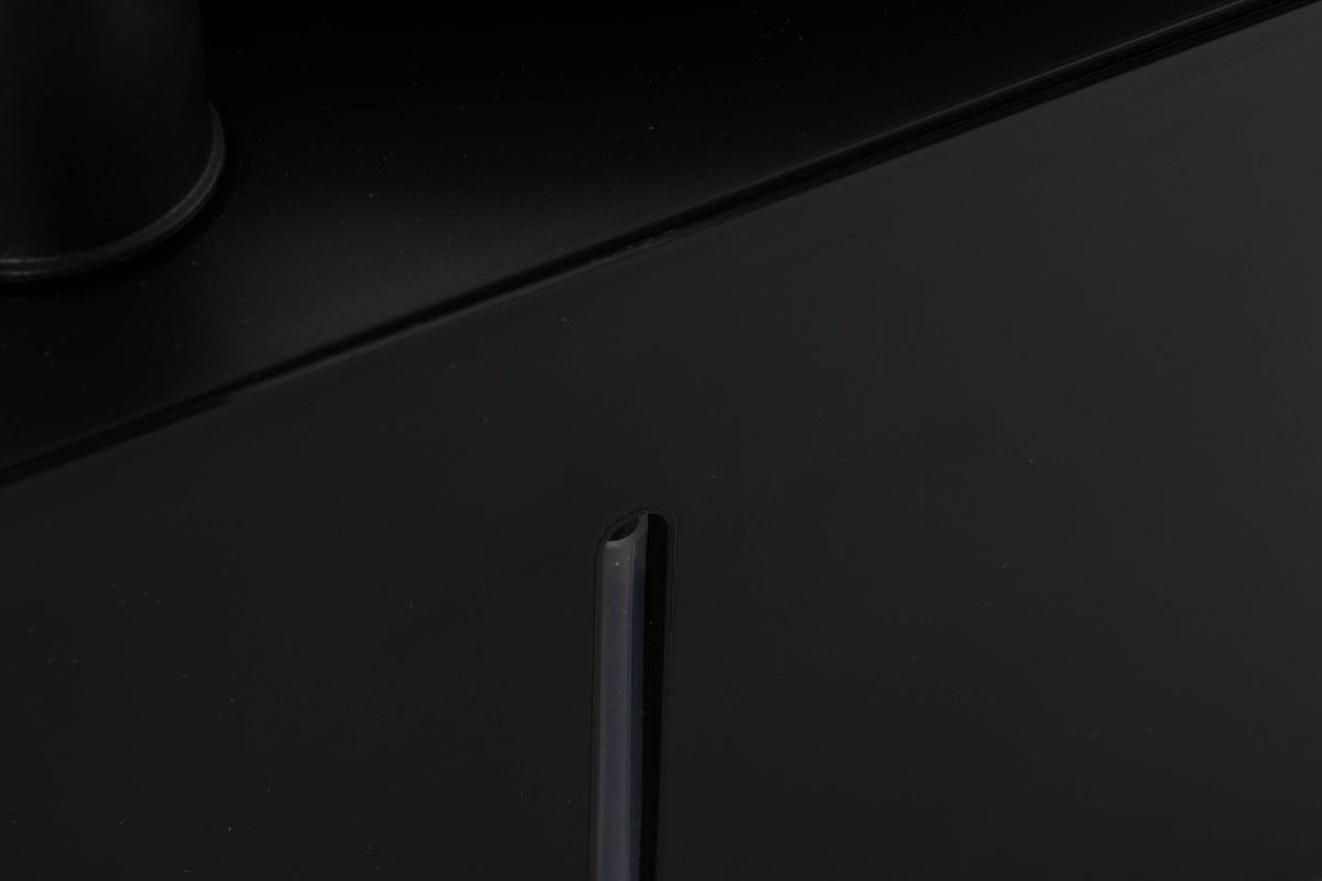 Close up of a used Okki Nokki One Record Cleaning Machine in a Black finish showing scratches near tube