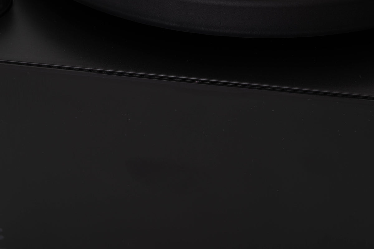 Close up of a used Okki Nokki One Record Cleaning Machine in a Black finish showing small mark on fascia