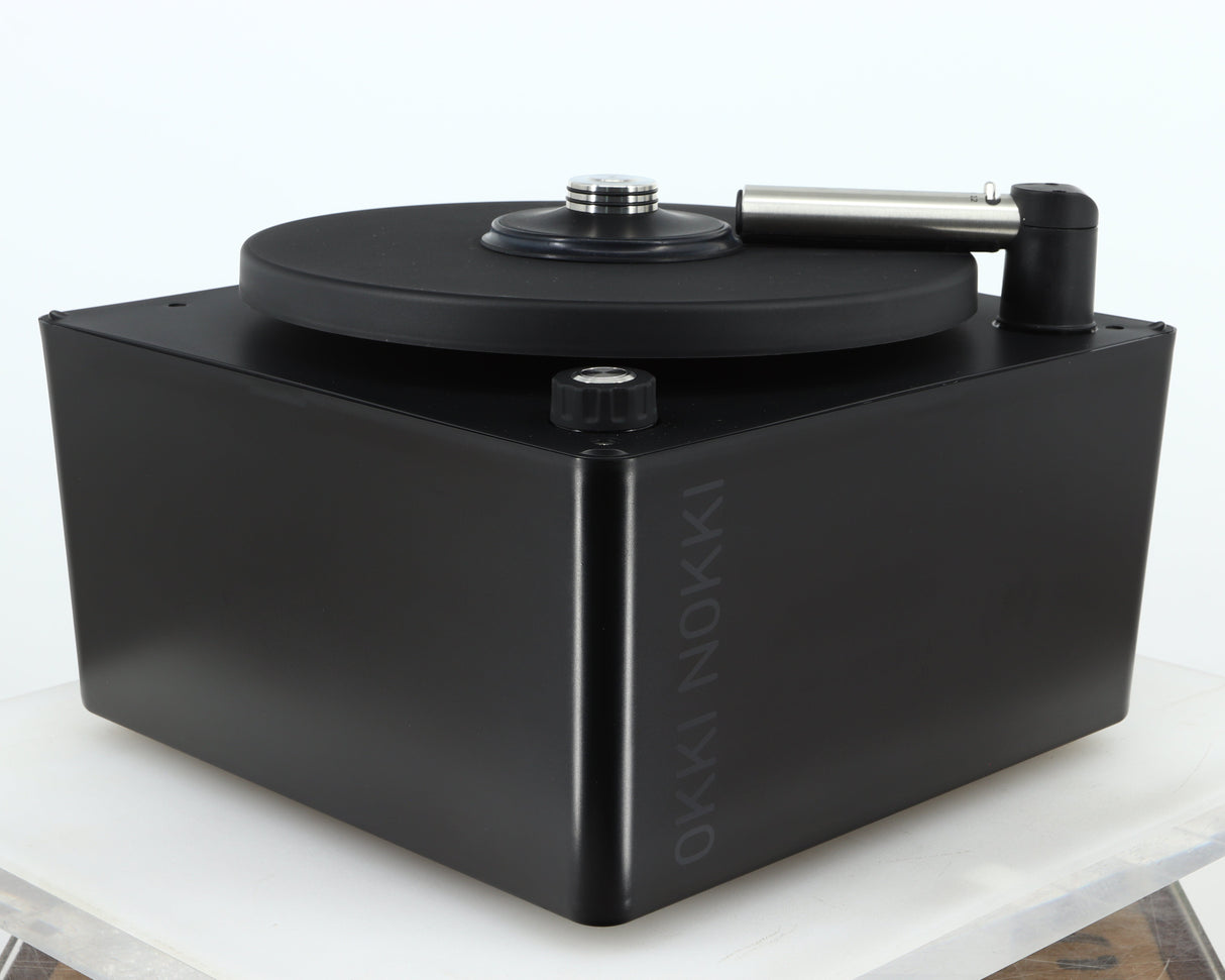 Front left corner of a used Okki Nokki One Record Cleaning Machine in a black finish