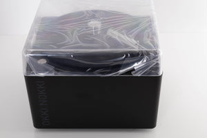 Top of a used Okki Nokki One Record Cleaning Machine in a Black finish showing Lid