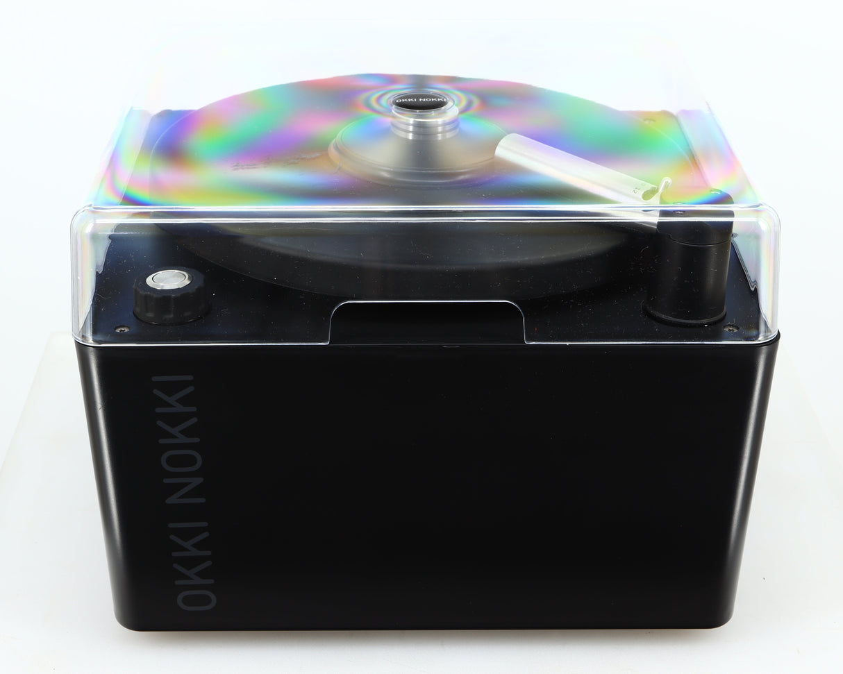 Top of a used Okki Nokki One Record Cleaning Machine in a black finish showing the lid