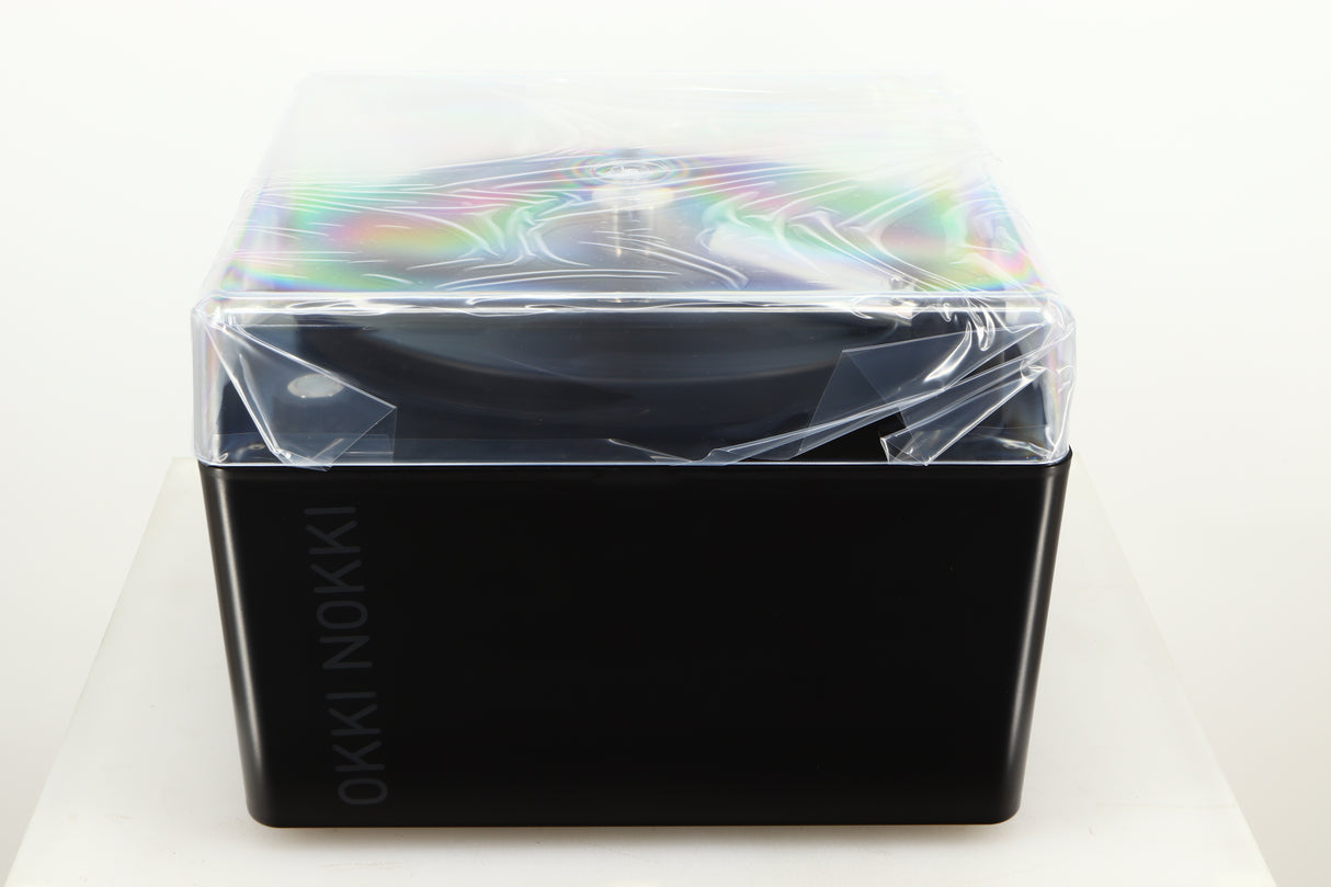 Top of a used Okki Nokki One Record Cleaning Machine in a black finish showing Lid