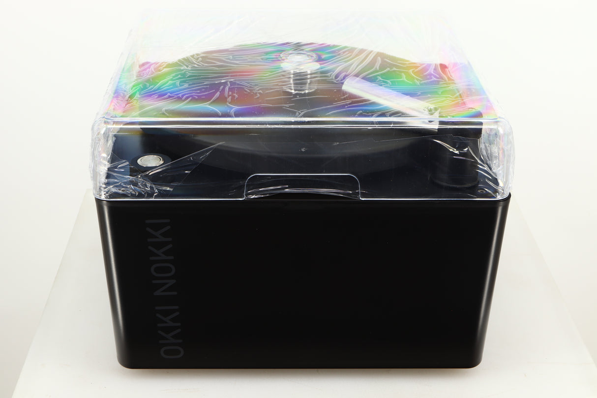 Top of a used Okki Nokki One Record Cleaning Machine in a black finish  showing Lid