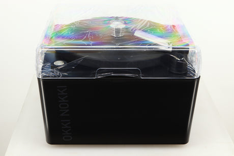 Top of a used Okki Nokki One Record Cleaning Machine in a black finish  showing Lid