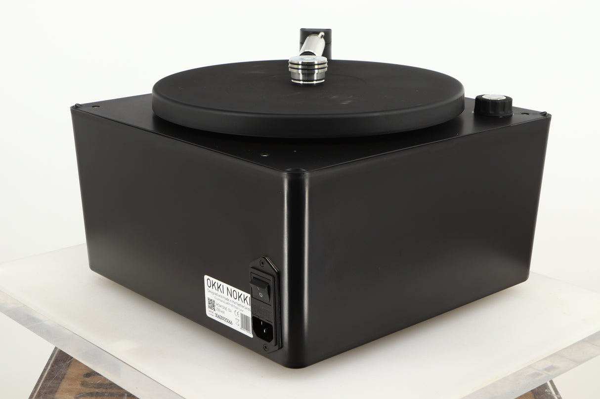 Rear left corner of a used Okki Nokki One Record Cleaning Machine in a black finish