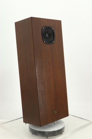 Front left angle of a used Omega Super 3XRS Floorstanding Speaker in a walnut finish
