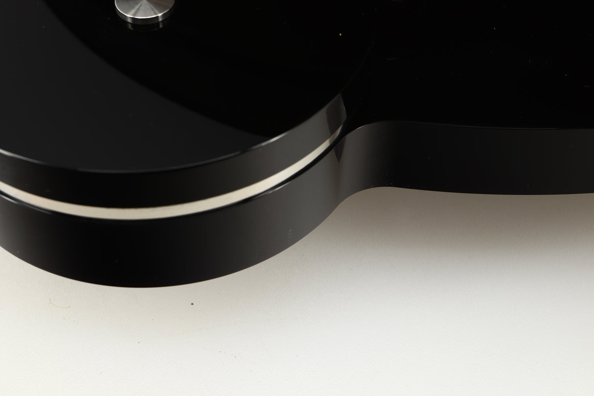 Close up view of a used Origin Live Calypso Mk5 Turntable with Encounter MK5 Tonearm showing some small light marks on the right side