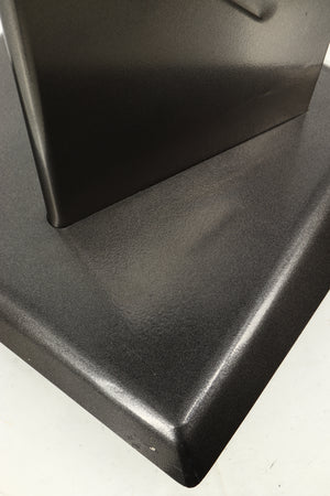 Close up of a used Partington Dreadnought Ultima 60cm Speaker Stand in a black mirror finish showing scratching on front bottom edge
