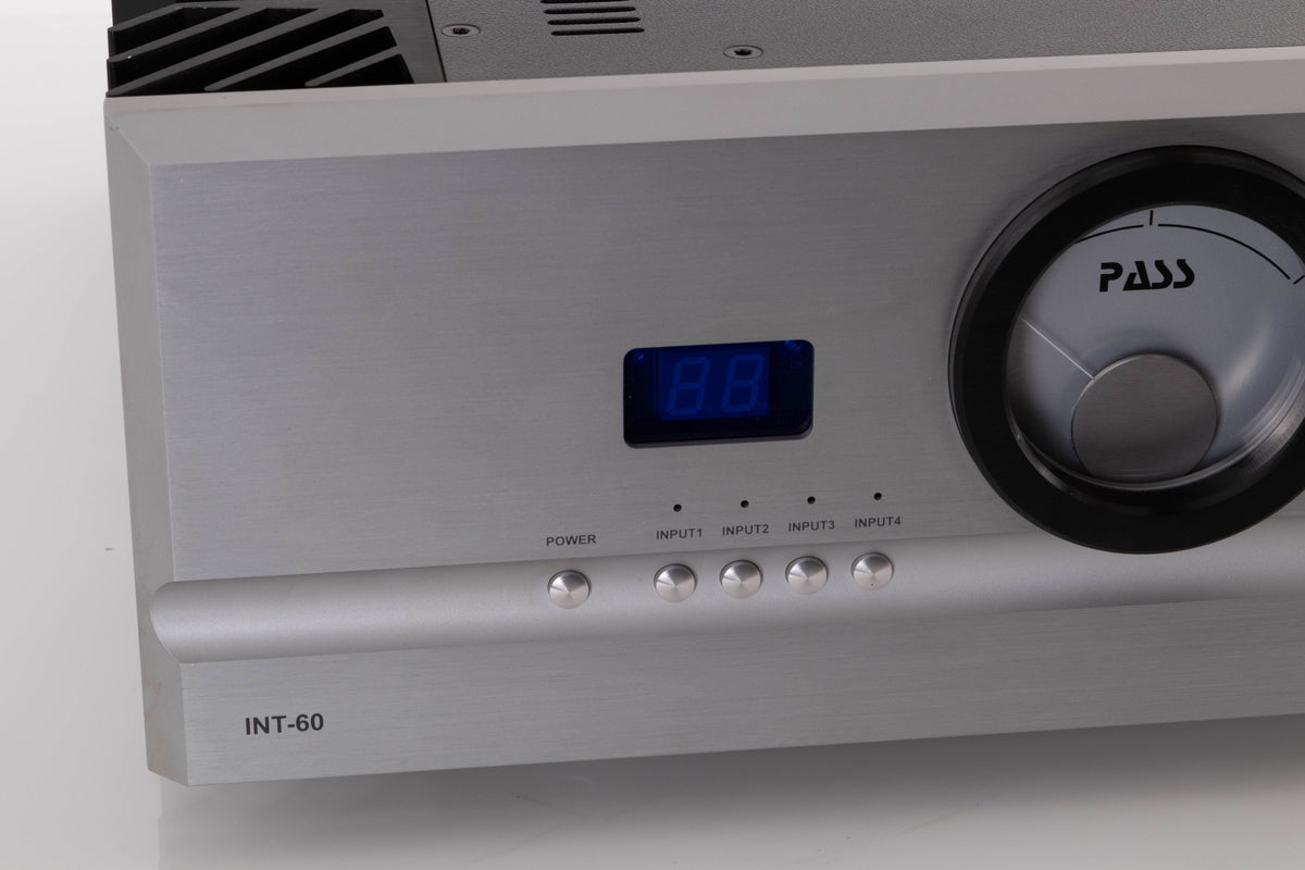 Close up view of a used PASS Labs INT-60 Integrated Amplifier in Silver