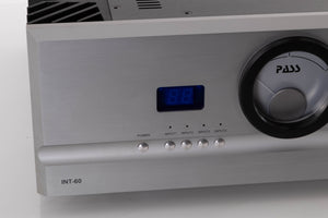 Close up view of a used PASS Labs INT-60 Integrated Amplifier in Silver