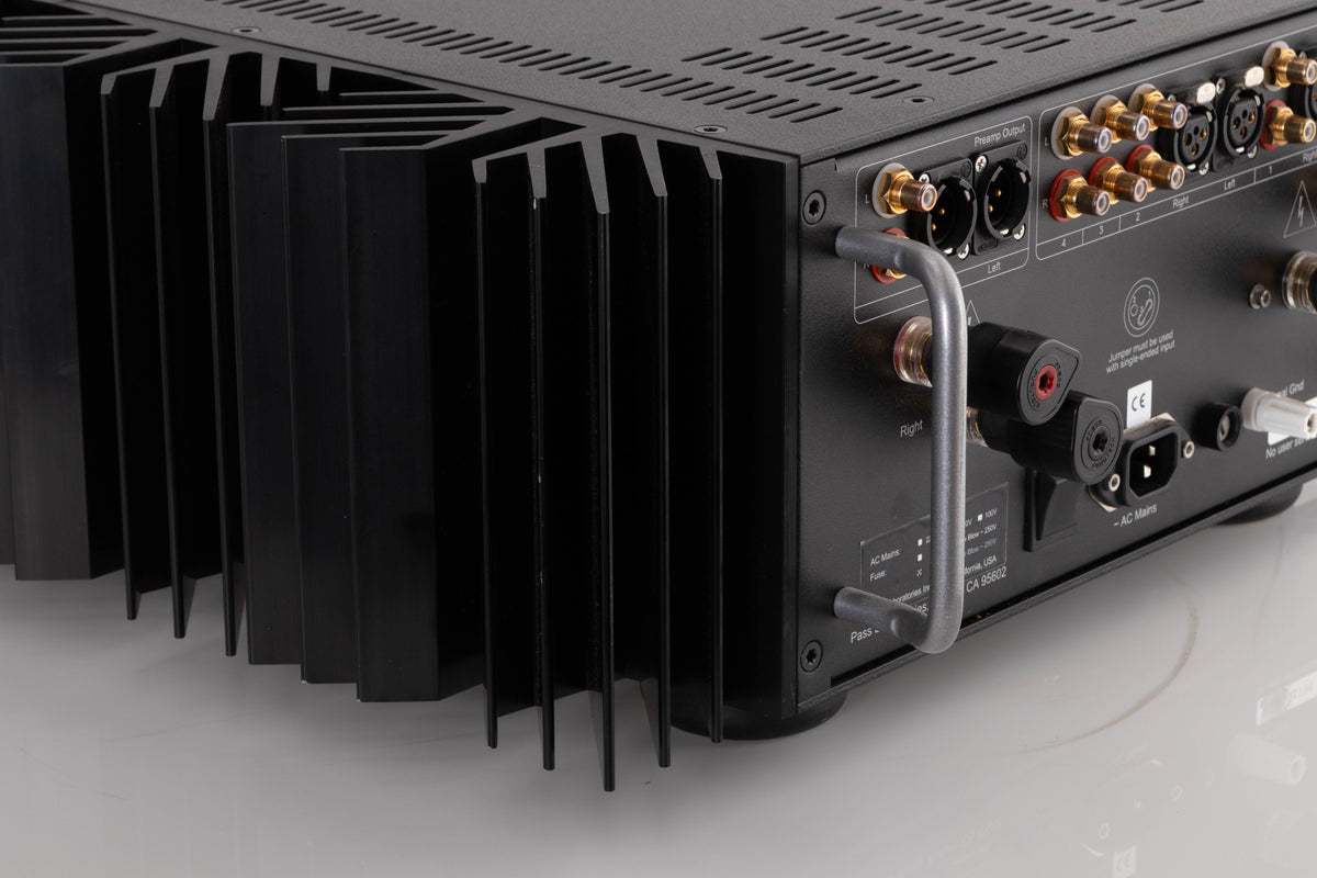 Rear left corner view of a used PASS Labs INT-60 Integrated Amplifier in Silver