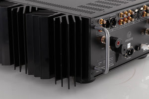 Rear left corner view of a used PASS Labs INT-60 Integrated Amplifier in Silver