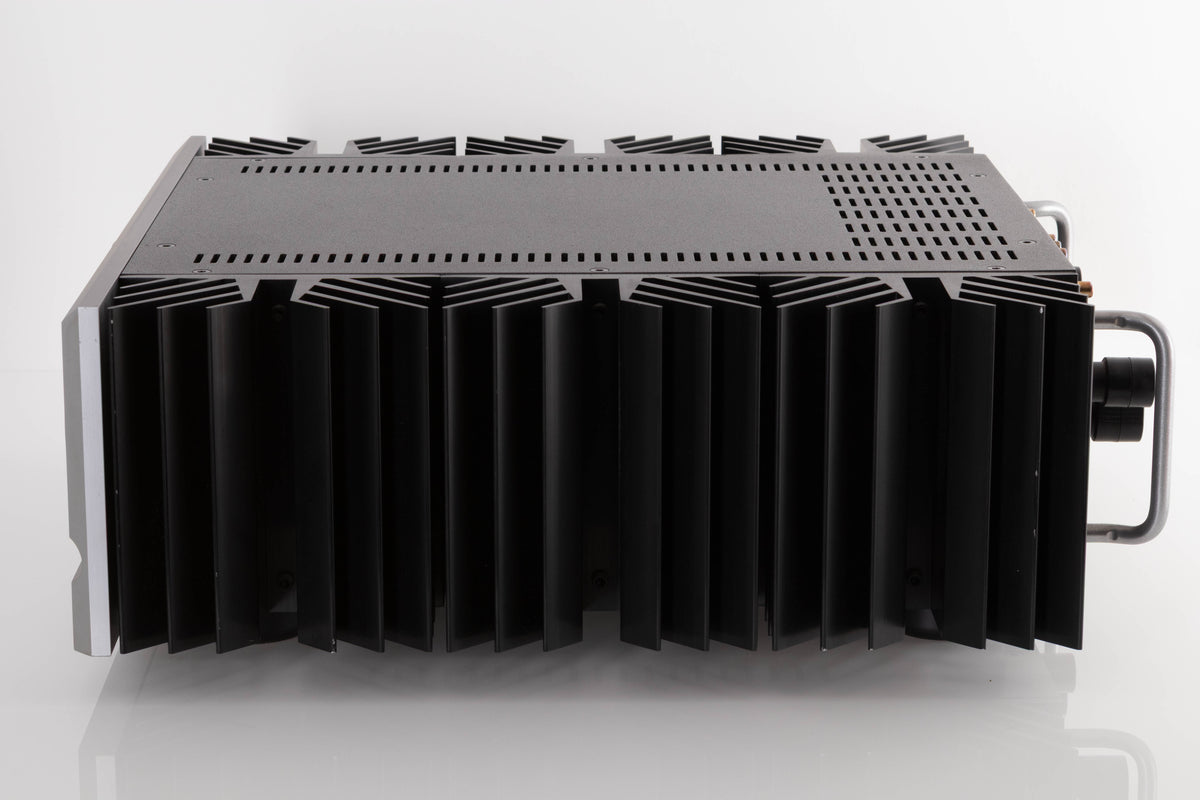 Side view of a used PASS Labs INT-60 Integrated Amplifier in Silver