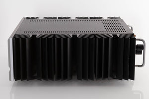 Side view of a used PASS Labs INT-60 Integrated Amplifier in Silver