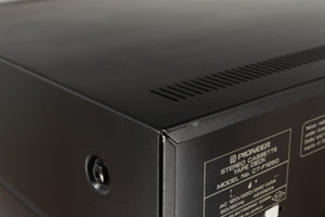 Close up of a used Pioneer CT-F1250 Cassette Deck in a silver finish showing some light scratches