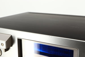 Close up of a used Pioneer CT-F1250 Cassette Deck in a silver finish showing some scratches on fascia edge