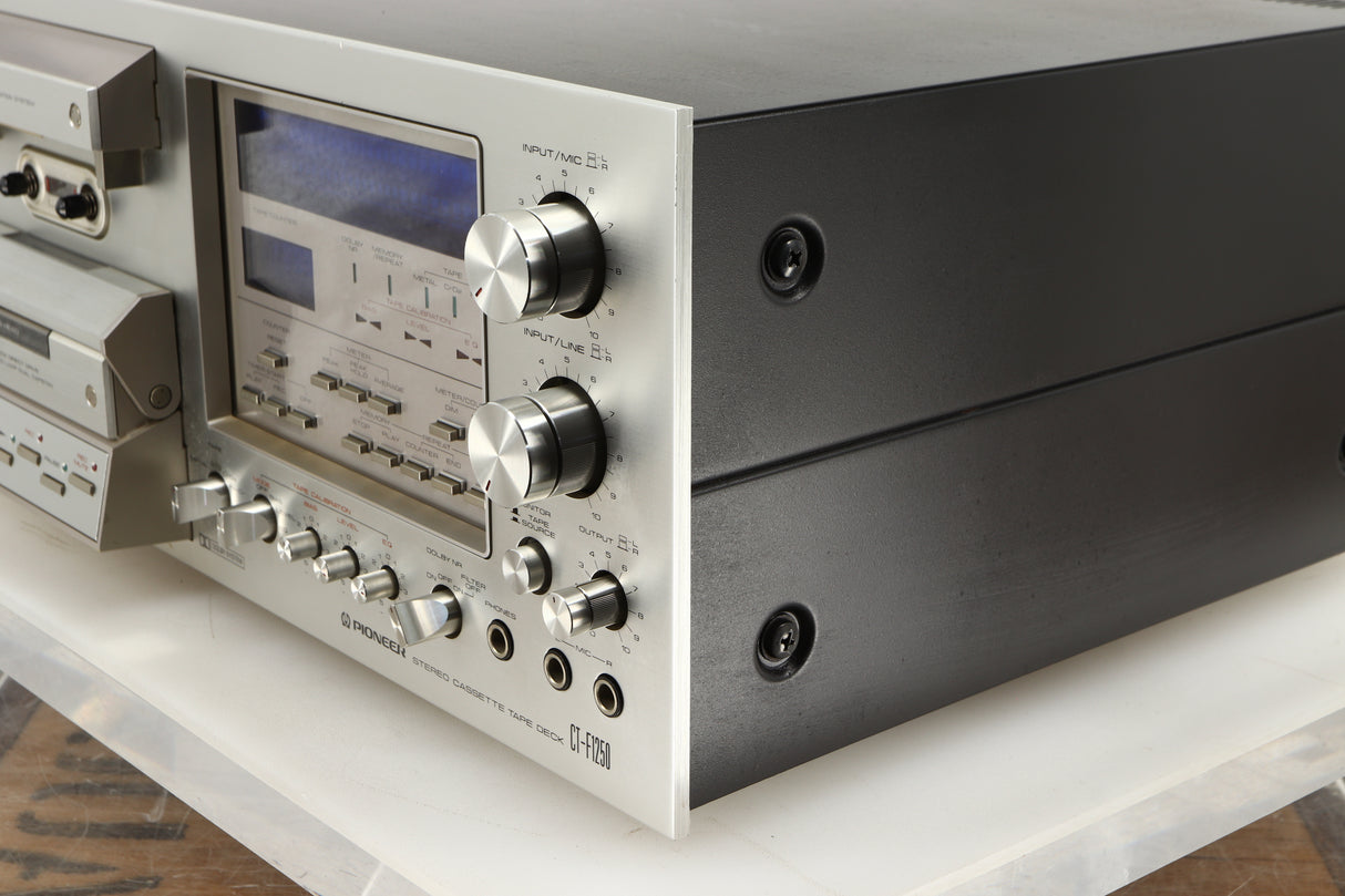 Front right corner view of a used Pioneer CT-F1250 Cassette Deck in a silver finish