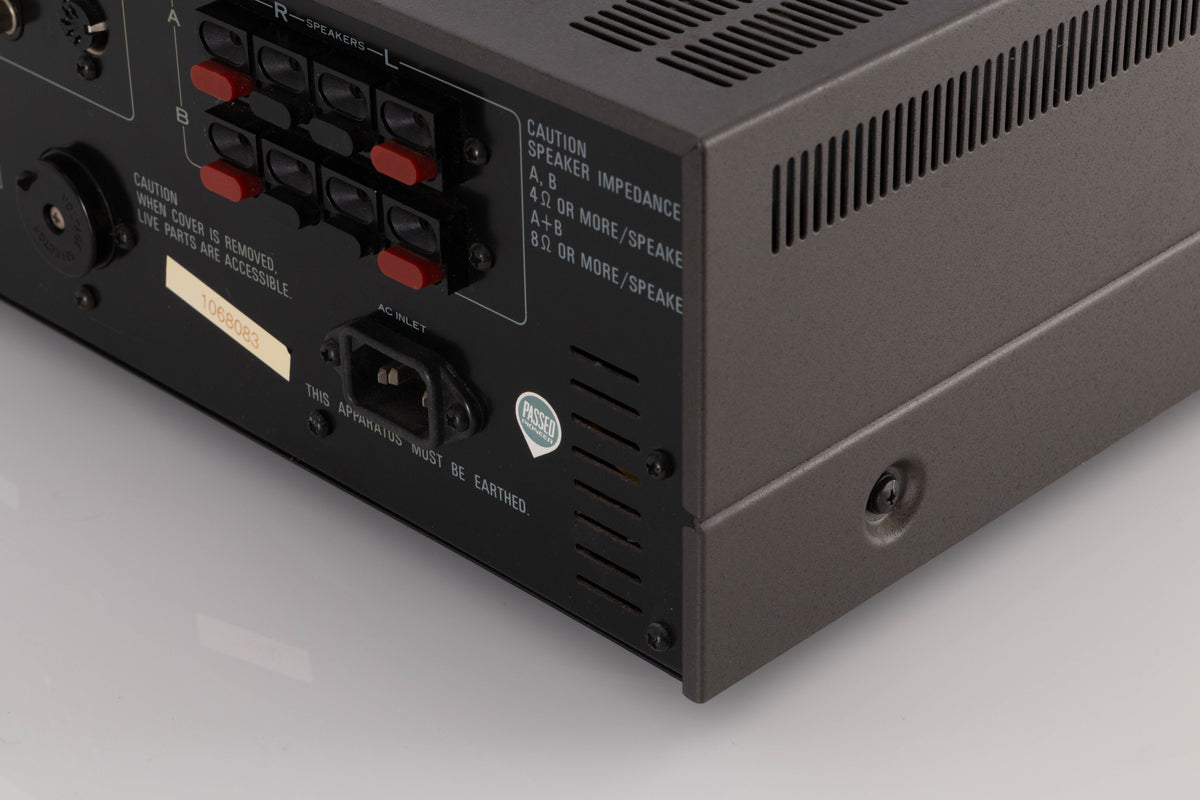 Rear right corner view of a used Pioneer SA-8500 II Integrated Amplifier