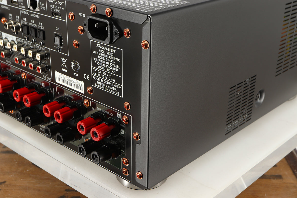 Rear left corner of a used Pioneer SC-LX75 AV Receiver in a black finish