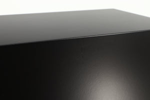 Close up of a used PMC DB1 Gold Standmount Speaker in a black finish showing small blemish on right side