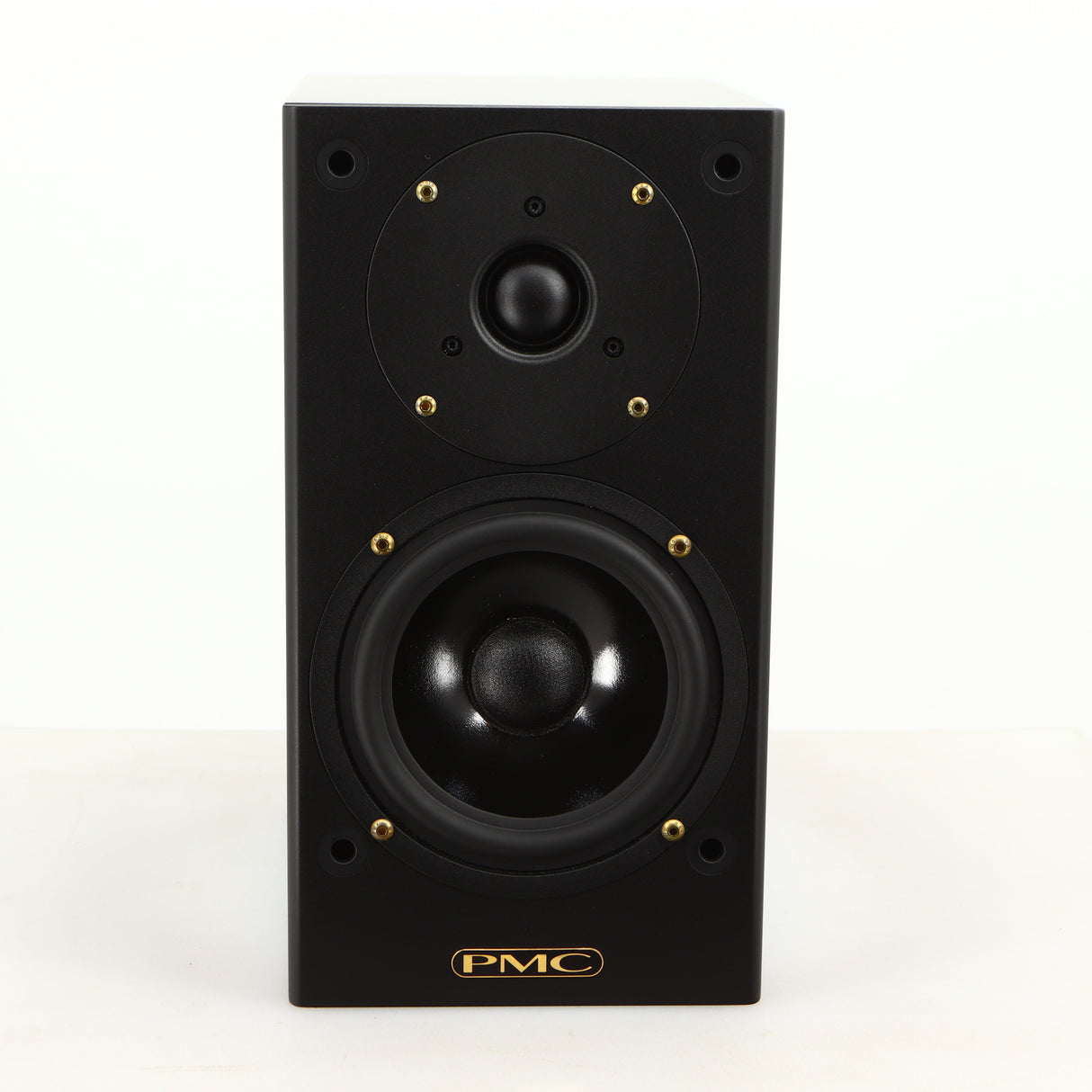 Front view of a used PMC DB1 Gold Standmount Speaker in a black finish