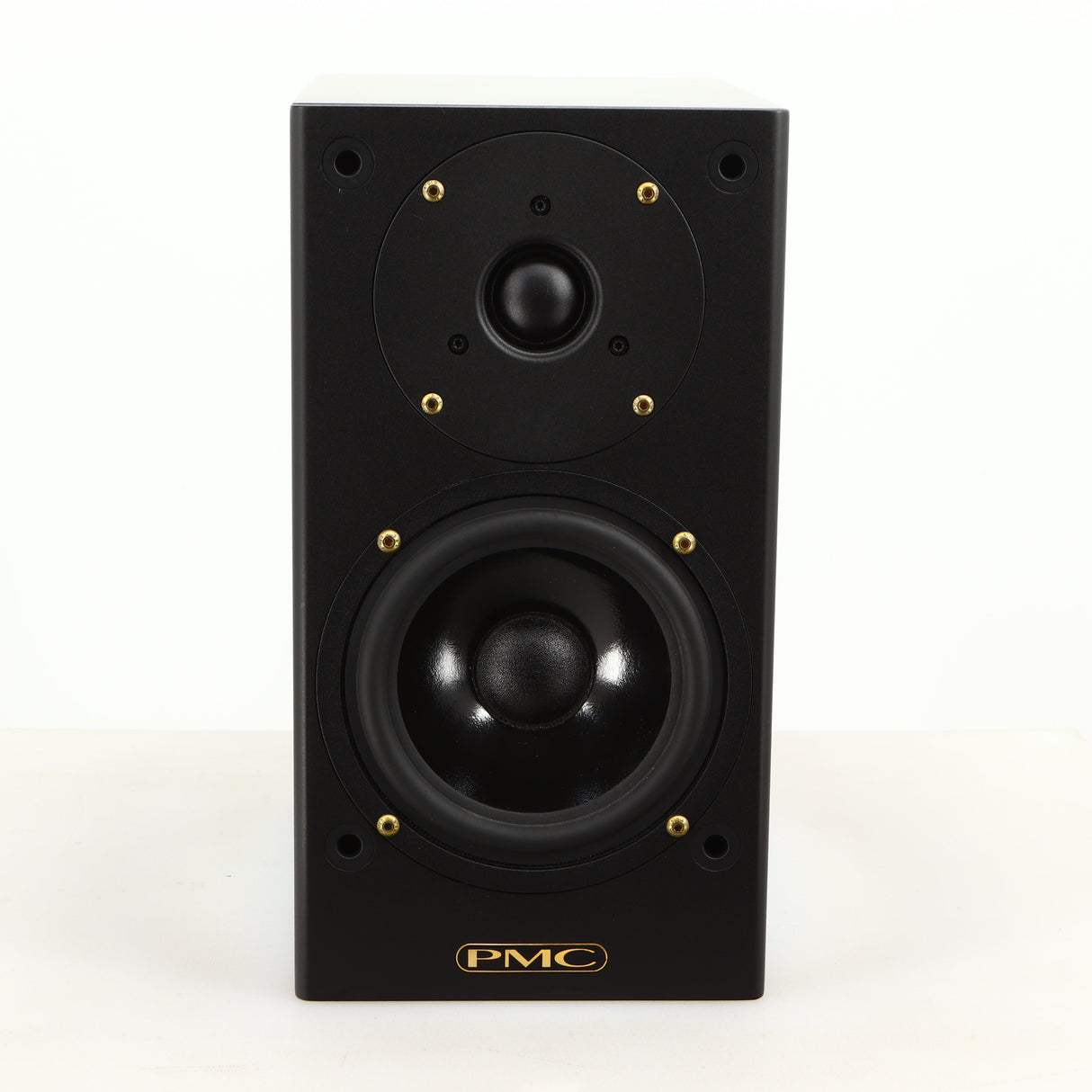 Front view of a used PMC DB1 Gold Standmount Speaker in a black finish