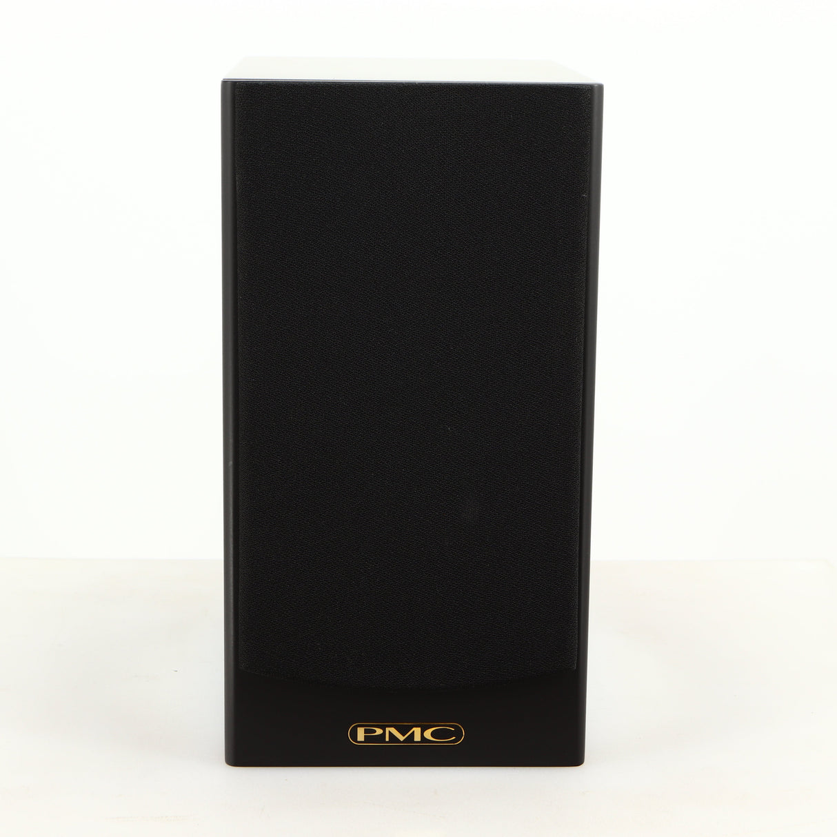 Front view of a used PMC DB1 Gold Standmount Speaker in a black finish showing Grille
