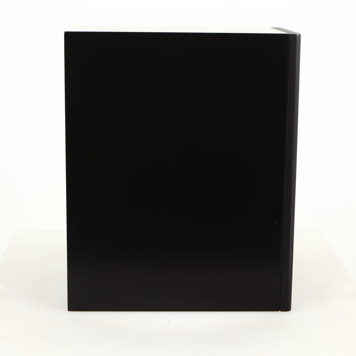 Left side view of a used PMC DB1 Gold Standmount Speaker in a black finish