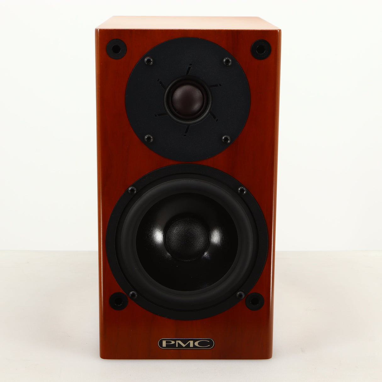 Front view of a used PMC DB1i Standmount Speaker in a cherry finish