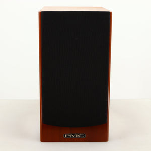 Front view of a used PMC DB1i Standmount Speaker in a cherry finish showing Grille