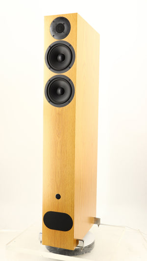 Front right corner of a used PMC FACT 8 Floorstanding Speakers in a light oak finish