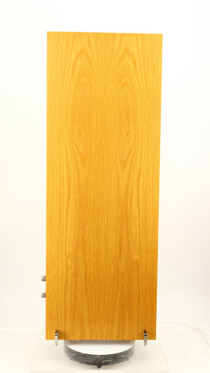 Left side view of a used PMC FACT 8 Floorstanding Speakers in a light oak finish