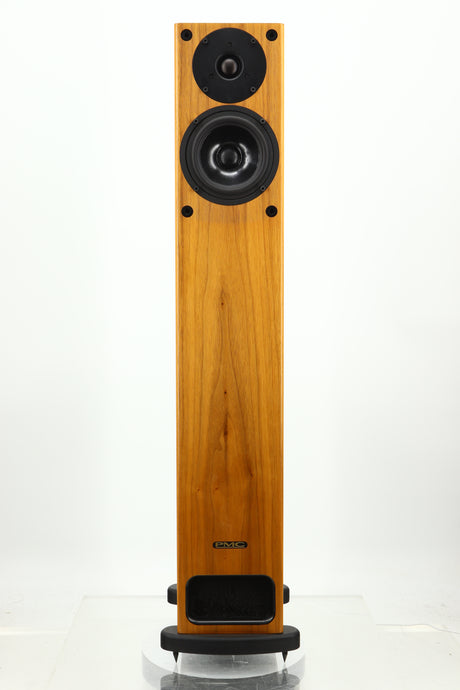 Front view of a PMC GB1 Floorstanding Speaker in a oak finish