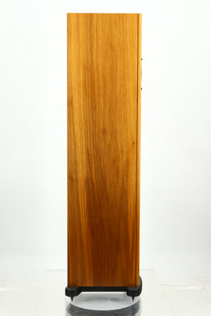 Left side view of a PMC GB1 Floorstanding Speaker in a oak finish