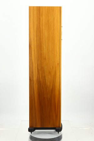 Left side view of a PMC GB1 Floorstanding Speaker in a oak finish