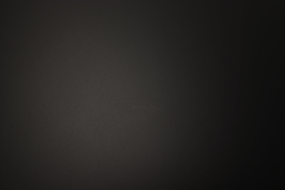 Close up of a used PMC Prodigy 1 Standmount Speaker in a black finish showing light scratch on right side 