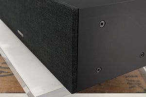 Front right corner of a used PMC ProphecyC Centre Speaker in a walnut finish