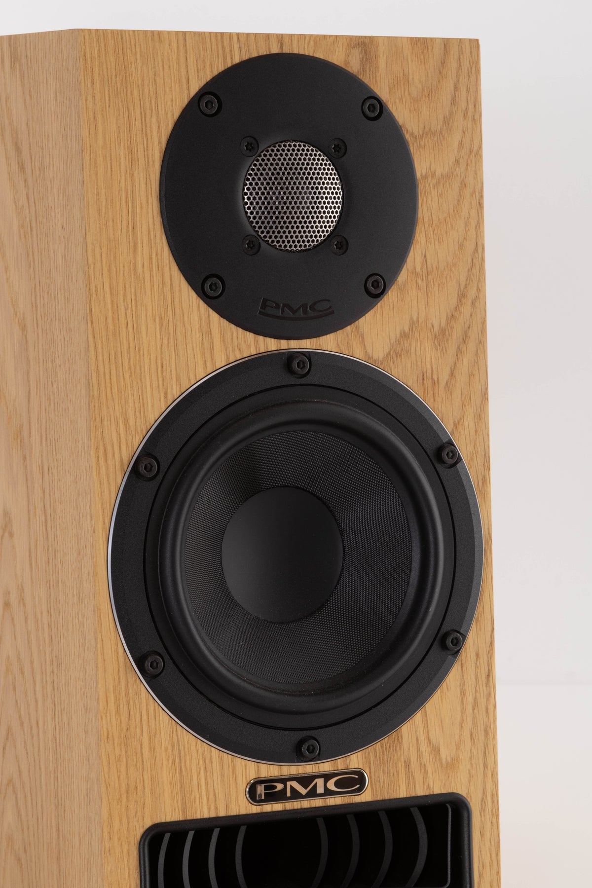 Close up view of a used PMC Twenty5 21i Standmount Speakers in Oak finish